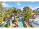 Enjoy a relaxing float down the lazy river, surrounded by palm trees and greenery at 2007 Disney Mgm Studio Ct, Kissimmee, FL 34746