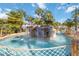 Relaxing lazy river with waterfall feature winds through lush tropical landscaping at 2007 Disney Mgm Studio Ct, Kissimmee, FL 34746