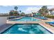 Community pool with spa and lounge chairs at 2007 Disney Mgm Studio Ct, Kissimmee, FL 34746