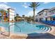 Large resort-style pool with plenty of lounge chairs and umbrellas at 2007 Disney Mgm Studio Ct, Kissimmee, FL 34746