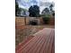 Backyard with wood deck, shed, and a privacy fence at 4530 Brook Hollow Cir, Winter Springs, FL 32708