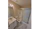 Bathroom with a vanity, toilet, and a shower stall with sliding glass doors at 4530 Brook Hollow Cir, Winter Springs, FL 32708