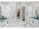 Large bathroom with marble finishes and walk-in closet at 7811 Skiing Way, Winter Garden, FL 34787