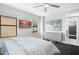 Serene bedroom with stunning water views and a dresser at 7811 Skiing Way, Winter Garden, FL 34787