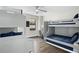 Bunk room with twin-size beds and a desk at 7811 Skiing Way, Winter Garden, FL 34787