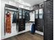 Bright walk-in closet with custom built-ins at 7811 Skiing Way, Winter Garden, FL 34787