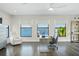 Serene home office with lake view and comfortable seating at 7811 Skiing Way, Winter Garden, FL 34787