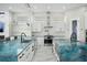 Double island kitchen with blue quartz countertops and high-end appliances at 7811 Skiing Way, Winter Garden, FL 34787