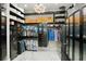 Custom laundry room with ample storage and washer/dryer at 7811 Skiing Way, Winter Garden, FL 34787