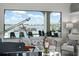 Living room features water views and access to the pool area at 7811 Skiing Way, Winter Garden, FL 34787