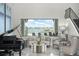 Living room features water views and plenty of natural light at 7811 Skiing Way, Winter Garden, FL 34787