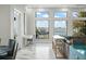 Living area with water views and comfortable seating at 7811 Skiing Way, Winter Garden, FL 34787