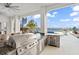 Outdoor kitchen with lake views and stainless steel grill at 7811 Skiing Way, Winter Garden, FL 34787