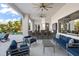 Covered patio with seating area and outdoor bar at 7811 Skiing Way, Winter Garden, FL 34787