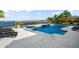 Resort-style pool with water features and lounge chairs at 7811 Skiing Way, Winter Garden, FL 34787
