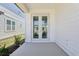 Private porch area featuring a door that brings the outside in at 2378 Broadbrook Dr, St Cloud, FL 34771