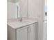 Bathroom featuring single vanity with stone countertop and a view into adjacent bedroom at 2378 Broadbrook Dr, St Cloud, FL 34771