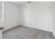 Bright, carpeted bedroom with neutral walls and ample natural light at 2378 Broadbrook Dr, St Cloud, FL 34771