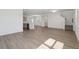 Open-concept living space with hardwood floors, ample natural light, and modern finishes at 2378 Broadbrook Dr, St Cloud, FL 34771