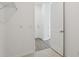 Walk-in closet with wire shelving and a view to the bedroom with plank floors at 2378 Broadbrook Dr, St Cloud, FL 34771