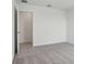 Well-lit bedroom with neutral carpet and white walls, providing a clean and comfortable space at 339 Conway Ave, St Cloud, FL 34771