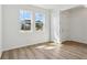 Sunlit bedroom featuring beautiful floors, a bright window, and fresh paint ready for customization at 339 Conway Ave, St Cloud, FL 34771