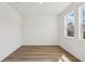 Bright and airy bedroom with stylish floors, a large window, and pristine white walls for a modern feel at 339 Conway Ave, St Cloud, FL 34771
