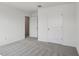 A well-lit bedroom with neutral carpet and fresh, white walls offers a tranquil and inviting space at 339 Conway Ave, St Cloud, FL 34771