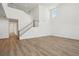 Spacious living room with staircase and hallway at 339 Conway Ave, St Cloud, FL 34771