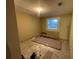 Under construction bedroom with new flooring at 3434 Avenue T Nw, Winter Haven, FL 33881