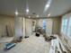 Under construction hallway with new doors and flooring at 3434 Avenue T Nw, Winter Haven, FL 33881