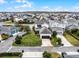 Aerial view of a well-maintained house with a large backyard and a two-car garage at 9133 Smithies St, Orlando, FL 32827