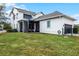 Beautifully maintained backyard with a pergola-covered patio and plenty of space for activities at 9133 Smithies St, Orlando, FL 32827