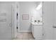 Spa-like bathroom with a walk-in shower and double vanity at 9133 Smithies St, Orlando, FL 32827