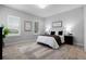Bright bedroom with neutral walls, plush carpet, and plantation shutters for optimal light control at 9133 Smithies St, Orlando, FL 32827