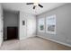 A serene bedroom with plush carpeting, bright windows, and ample closet space at 9133 Smithies St, Orlando, FL 32827