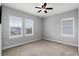 Spacious bedroom with neutral walls and carpet flooring at 9133 Smithies St, Orlando, FL 32827