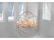 Unique chandelier features globe design and crystal accents at 9133 Smithies St, Orlando, FL 32827