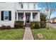 Charming two-story home with covered porch and well-maintained landscaping at 9133 Smithies St, Orlando, FL 32827