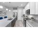 Modern kitchen with stainless steel appliances and granite countertops at 9133 Smithies St, Orlando, FL 32827