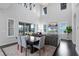Open living space with high ceilings, dining area, and a comfortable living room at 9133 Smithies St, Orlando, FL 32827