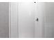 Shower featuring white subway tile and modern fixtures at 9133 Smithies St, Orlando, FL 32827