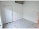Simple bedroom with tile floors and ample closet space at 147 Dahlia Village Cir # Ge, Orlando, FL 32807