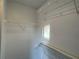 Spacious closet with wire shelving at 147 Dahlia Village Cir # Ge, Orlando, FL 32807
