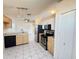 Modern kitchen with stainless steel appliances and ample counter space at 147 Dahlia Village Cir # Ge, Orlando, FL 32807