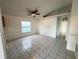 Living room with tile floors and ceiling fan at 147 Dahlia Village Cir # Ge, Orlando, FL 32807