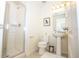 Shower stall, toilet, and pedestal sink at 5149 Adelaide Dr, Kissimmee, FL 34746