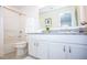 Clean bathroom with granite countertop and white cabinets at 5149 Adelaide Dr, Kissimmee, FL 34746