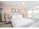 King-size bed, nightstands, and ample natural light at 5149 Adelaide Dr, Kissimmee, FL 34746