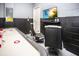 Game room with air hockey and gaming chairs at 5149 Adelaide Dr, Kissimmee, FL 34746